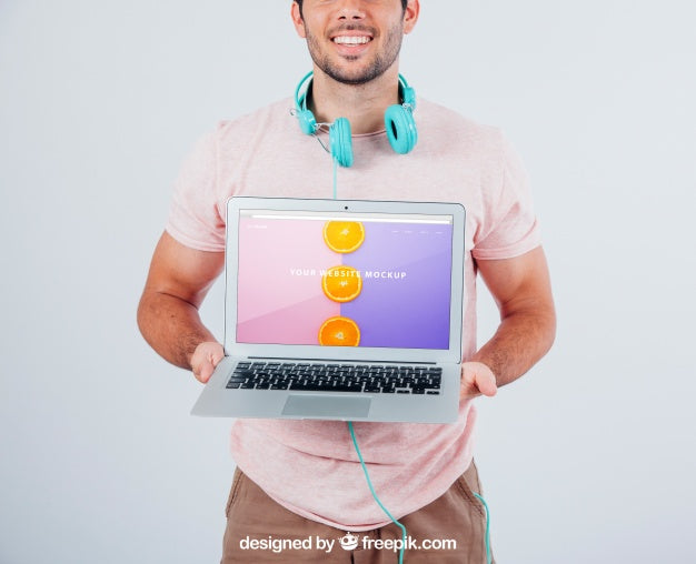 Happy Guy Holding Laptop'S Mock Up Psd
