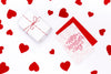 Happy Valentines Day Card Next To Wrapped Gift Psd