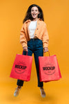 Happy Woman Holding Shopping Bags Psd