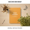 Hard Cover Book Mockup With Plant And Pencils Psd