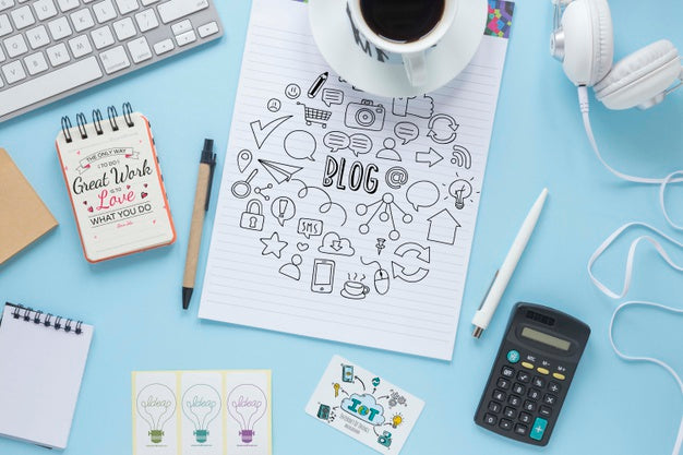 Headphones Keyboard And Notebooks On Blue Background Psd