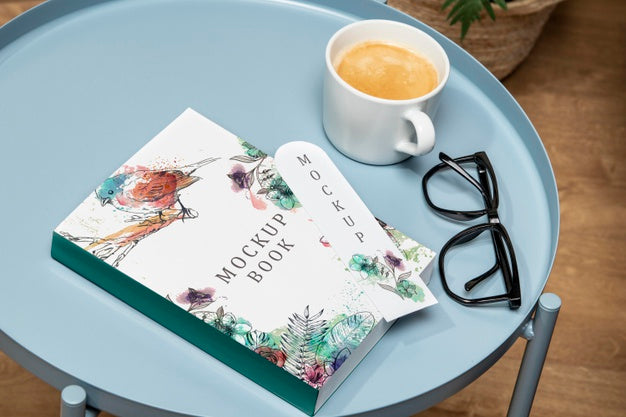 High Angle Book Mock-Up On Coffee Table Psd