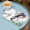 High Angle Book Mock-Up On Coffee Table With Glasses And Bookmark Psd