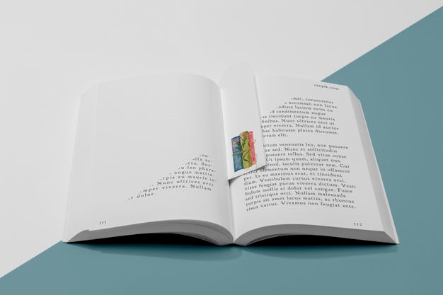 High Angle Bookmark And Open Book Mock-Up Psd