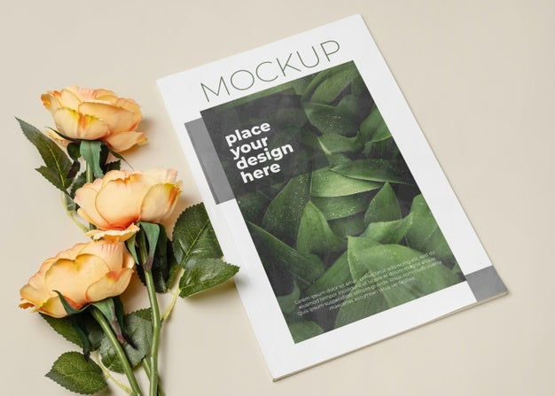 High Angle Magazine And Beautiful Flowers Psd