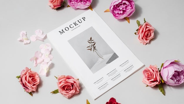 High Angle Magazine And Flowers Mockup Psd