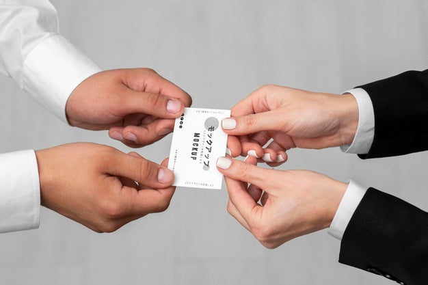 High Angle Men Holding Business Cards Mock-Up Psd