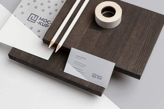 High Angle Mock-Up Stationery On Wood Composition Psd