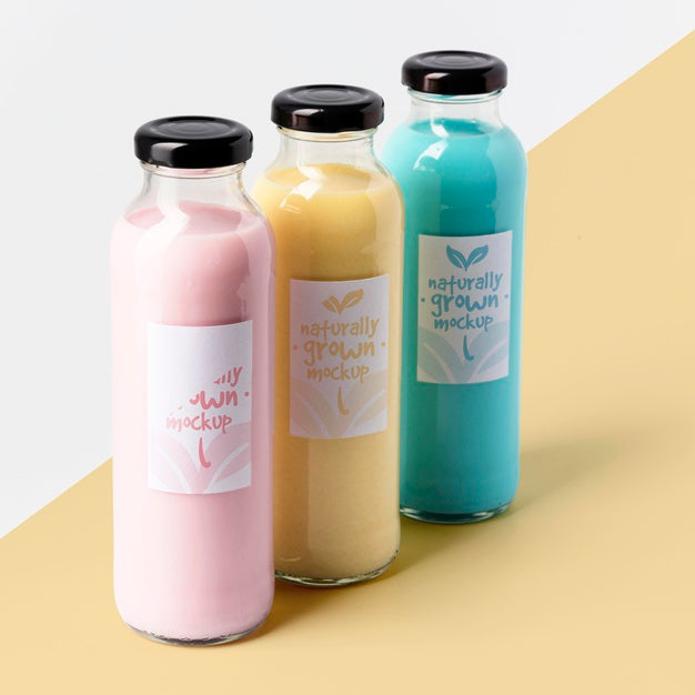 High Angle Of Assortment Of Clear Juice Bottles Psd