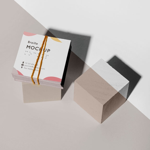 High Angle Of Business Cards With Embossed Braille Writing Mock-Up Psd