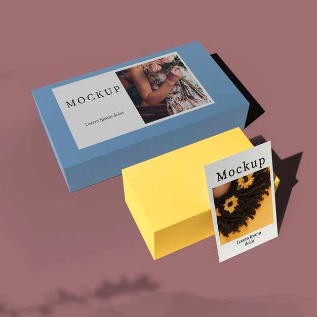 High Angle Of Card On Boxes With Shadow Psd