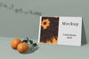 High Angle Of Card With Photo And Oranges Psd