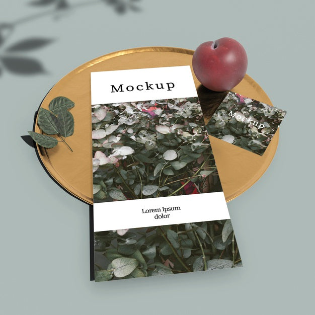 High Angle Of Card With Plum On Golden Tray Psd