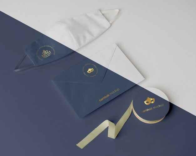 High Angle Of Carnival Invitation In Envelope With Face Mask And Tape Psd