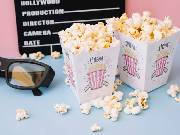 High Angle Of Clapperboard With Cinema Glasses And Popcorn Psd