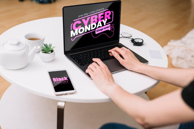 High Angle Of Cyber Monday Mock-Up On Desk Psd