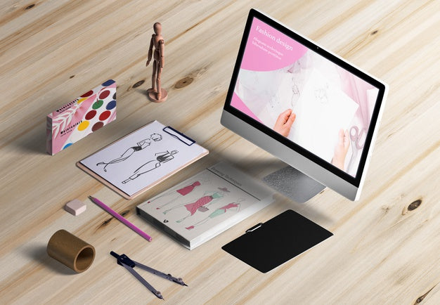 High Angle Of Designer Desk With Acuarelas Psd