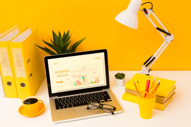 High Angle Of Desk With Laptop And Glasses Psd