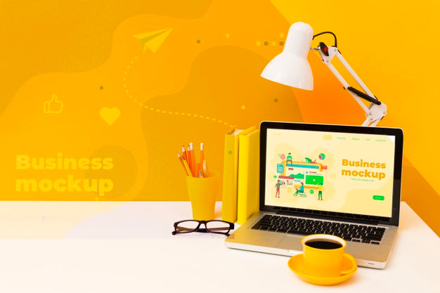 High Angle Of Desk With Laptop And Lamp Psd