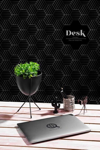 High Angle Of Desk With Plant And Laptop Psd