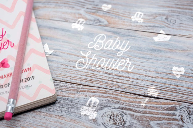 High Angle Of Notebook For Baby Shower Psd