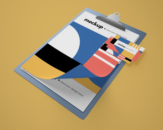 High Angle Of Notepad Mock-Up With Geometric Design And Card Psd