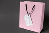 High Angle Of Paper Shopping Bag Mock-Up With Paper Tag Psd