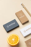 High Angle Of Paper Stationery With Citrus And Pen Psd