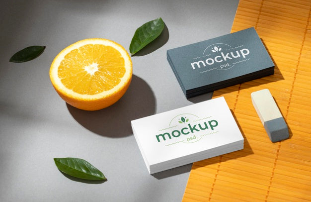 High Angle Of Paper Stationery With Citrus Fruit Psd