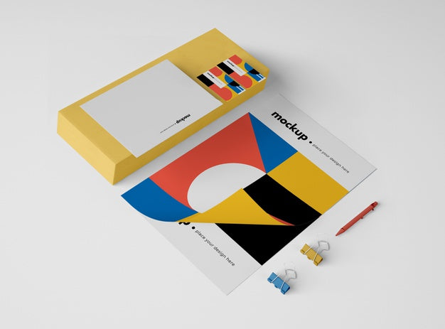 High Angle Of Paper With Paper Clips And Pen Psd