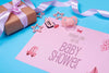 High Angle Of Pink Baby Invitation With Gift Psd