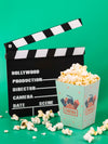 High Angle Of Popcorn With Clapperboard Psd
