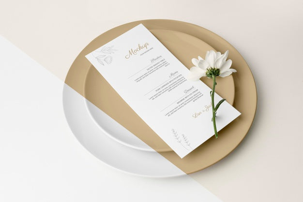 High Angle Of Table Arrangement With Spring Flower And Menu Mock-Up Psd