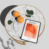 High Angle Of Tablet On Table With Oranges And Leaves Psd