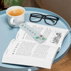 High Angle Open Book Mock-Up On Coffee Table With Glasses Psd