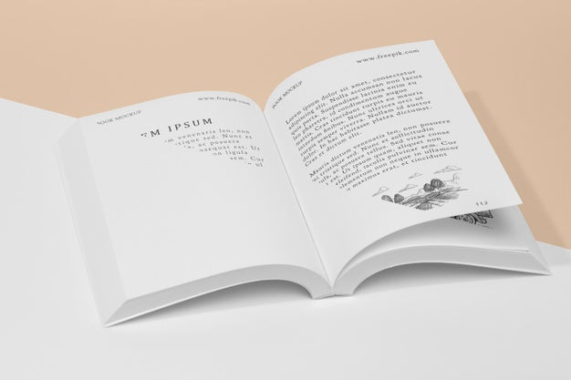 High Angle Open Book Mock-Up With Illustration Psd