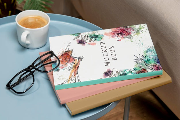 High Angle Stack Of Books Mock-Up On Coffee Table With Glasses Psd