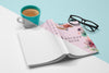 High Angle Turned Over Open Book Mock-Up With Glasses And Coffee Psd