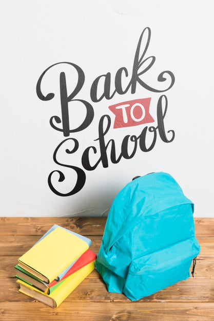 High View Backpack With Pile Of Books Psd