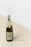 High View Champagne Bottle Mock-Up With Ribbon Bow Psd