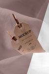 High View Mock-Up Of Clothing Labels On Soft Fabric Psd