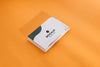 High View Pile Of Business Cards On Orange Background Psd