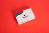 High View Pile Of Business Cards On Red Background Psd