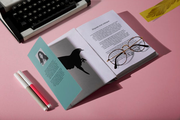 High View Reading Glasses On Book And Typewriter Psd