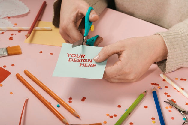 High View Woman Cutting A Handmade Sign Psd