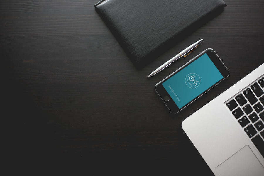 iPhone 7 Mockup on a Black Table