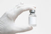 Injection Bottle With Label Mockup In Nurse'S Hand Psd
