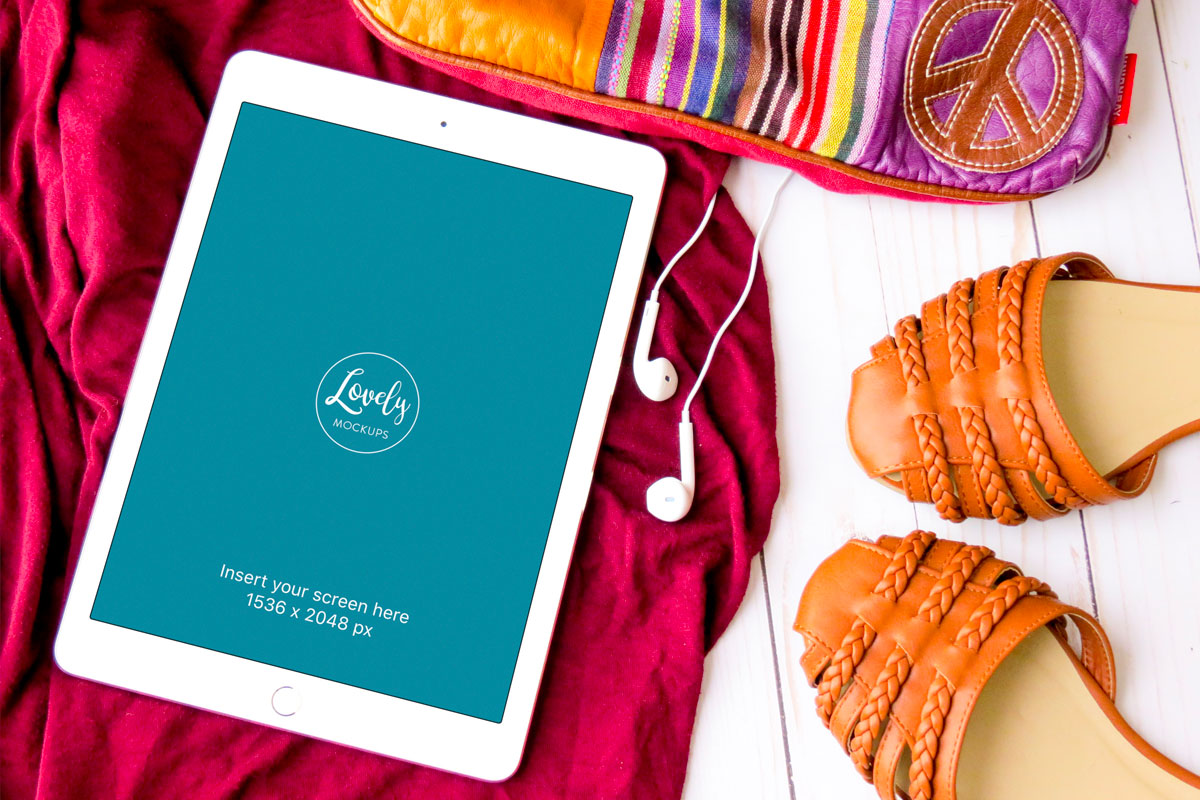 White iPad Mockup With Shoes And A Fancy Bag