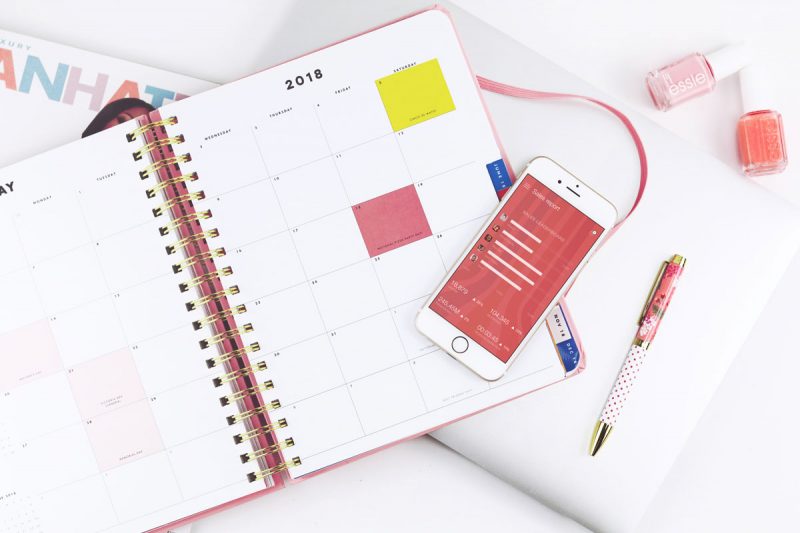 iPhone Mockup With A Calendar On A Table