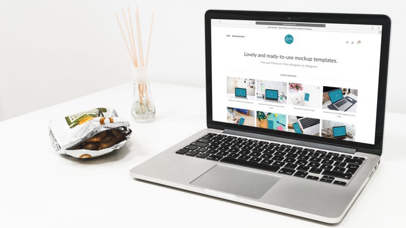 Macbook Pro Mockup On The White Table